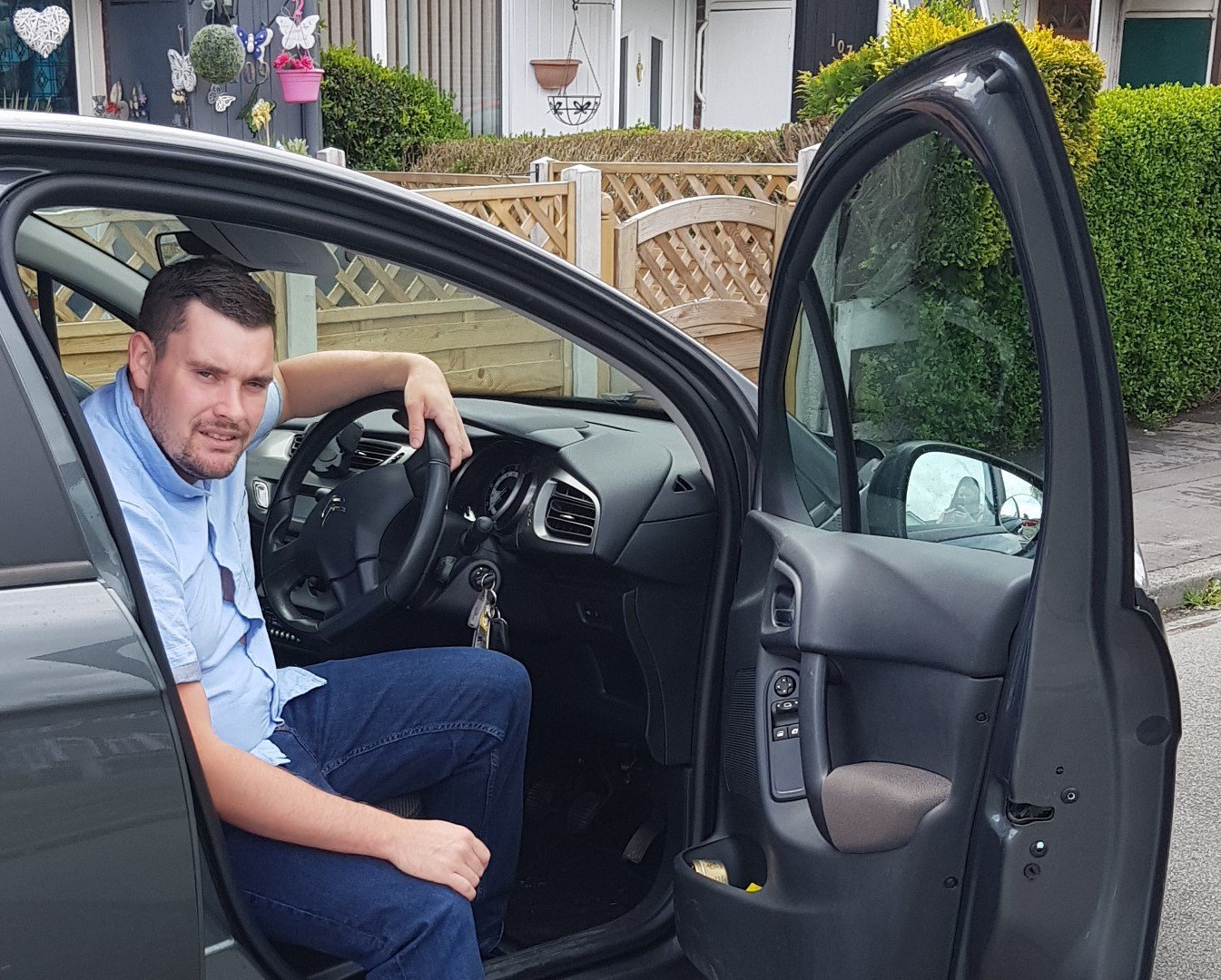 Professional driving instructor with student