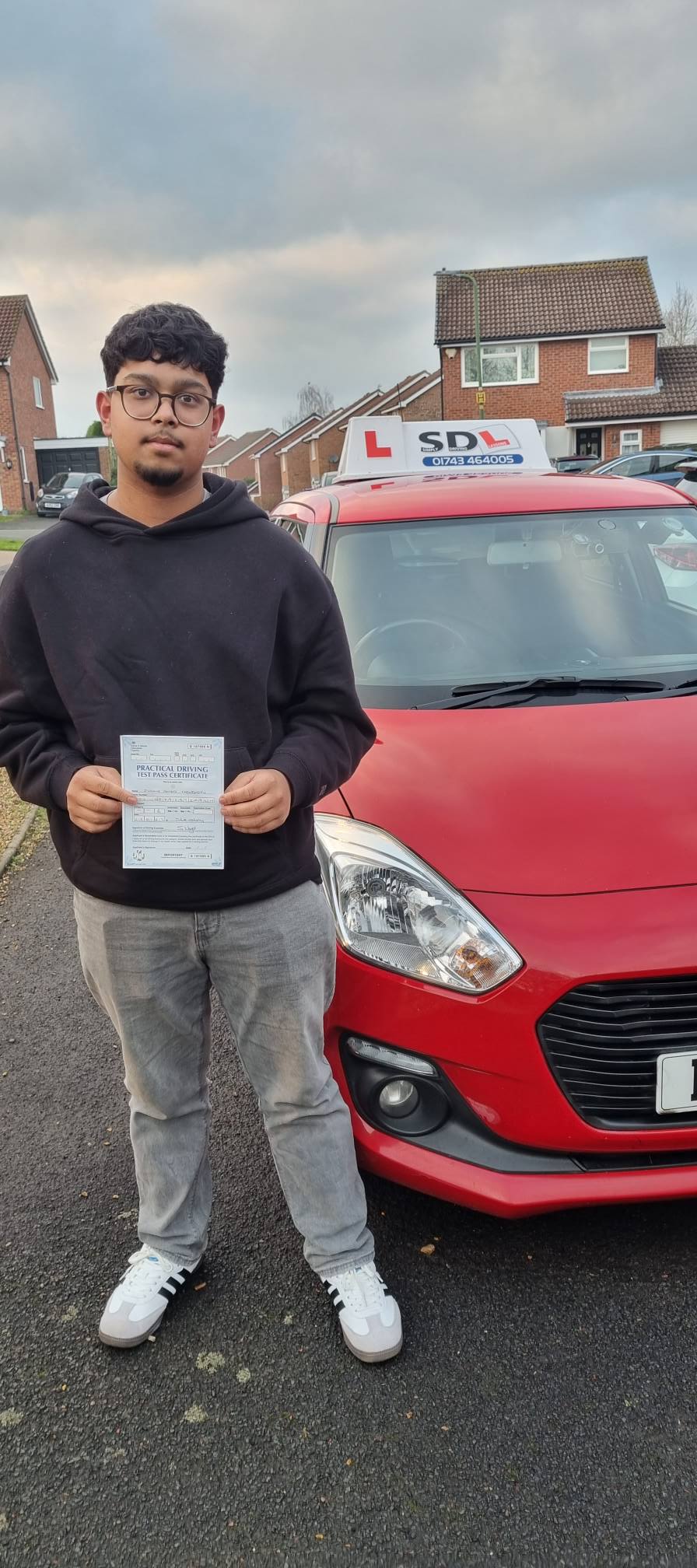 Student receiving feedback in car